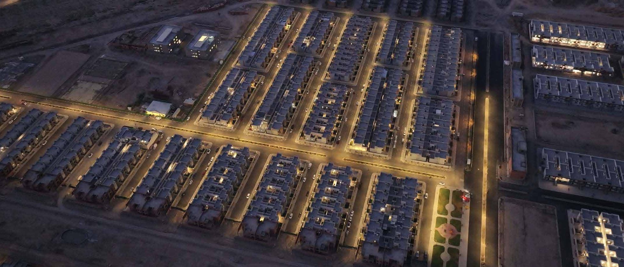 Al Kadhimiya New City: aerial view of the townhouse neighbourhoods at dusk