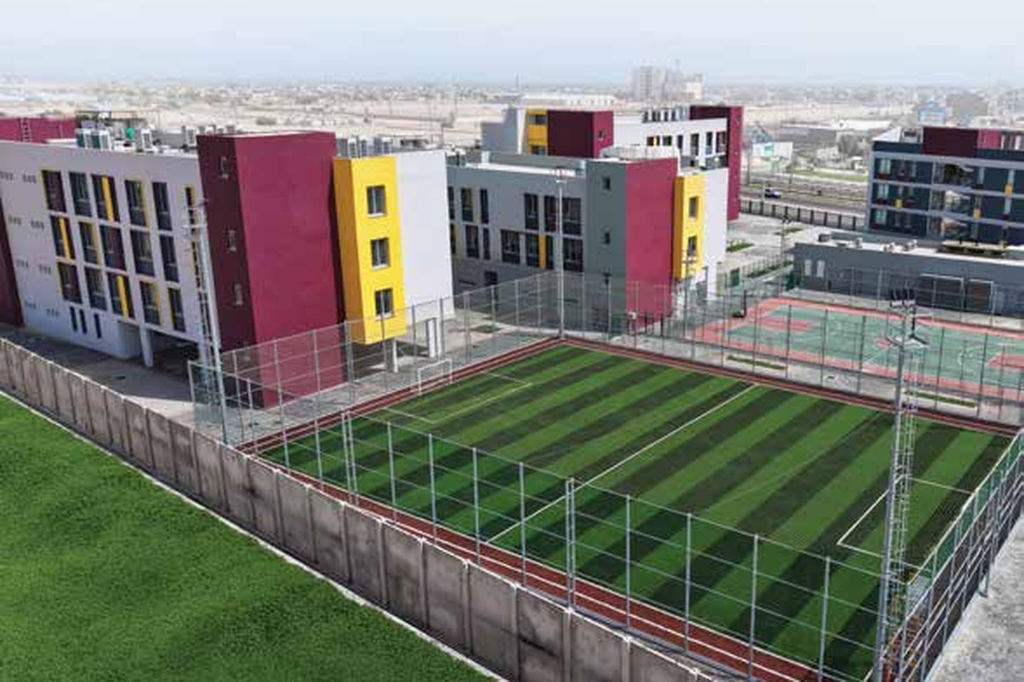 Cadmus Downtown Basra campus with sports field