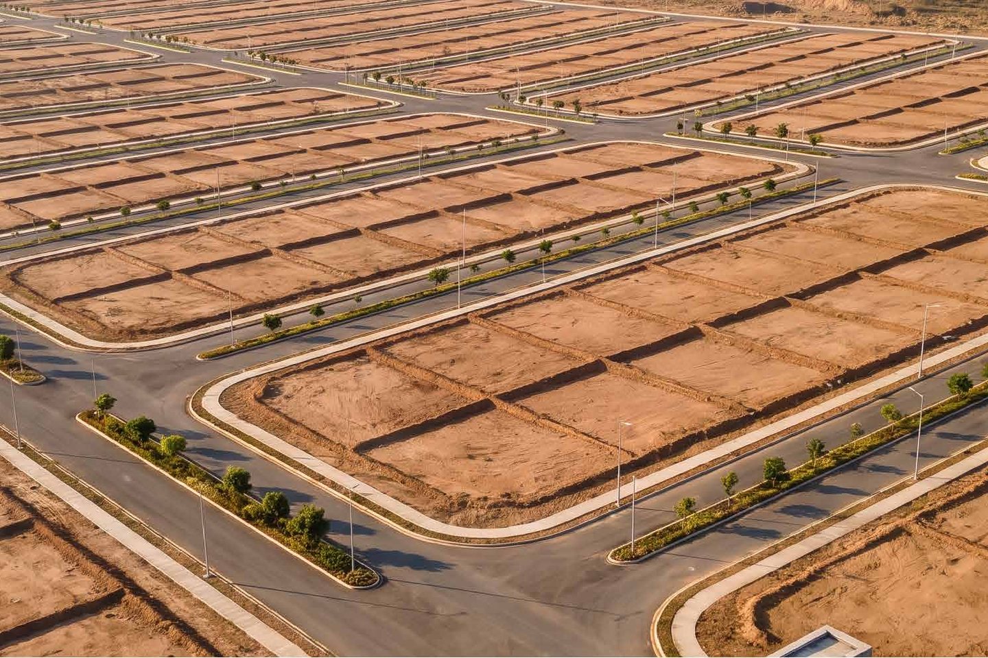 Aerial view of the plot grid at Madinat Al Kut Al Sakaniah